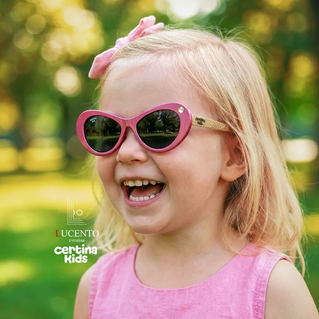 عینک آفتابی کودک Certina Kids مدل CK-Flexi 107 | فریم صورتی براق نگین‌دار، دسته‌های اکلیلی طلایی، عدسی UV400 پولاریزه ( مناسب ۱-۴ سال )